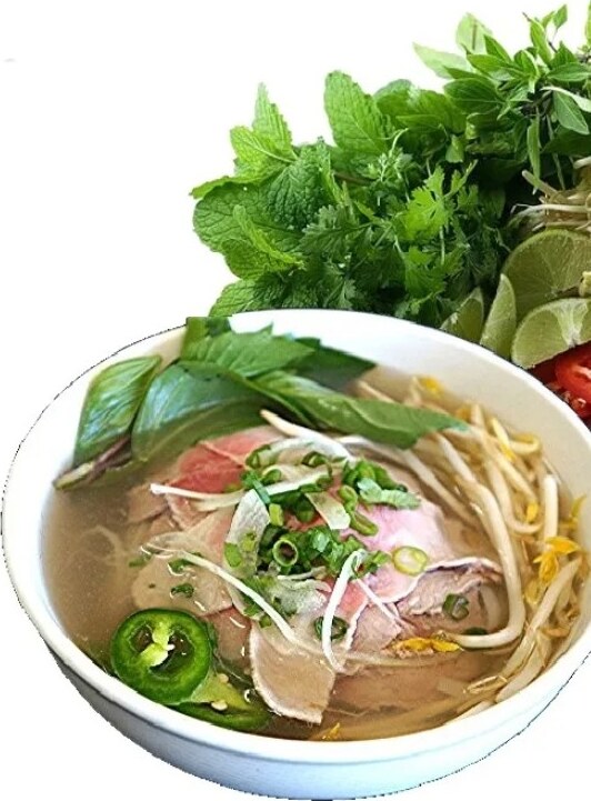 Phở tái nạm — beef noodle soup with fresh herbs